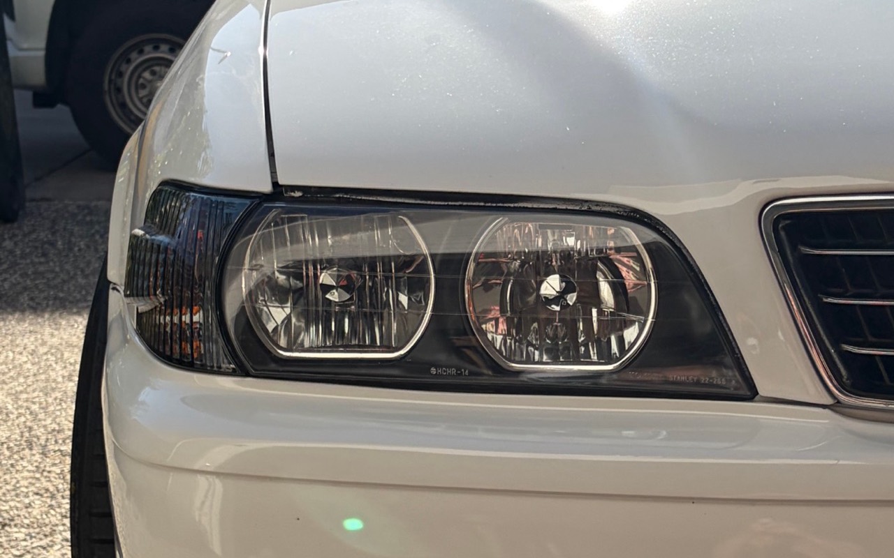 Crystal clear Toyota Chaser headlight after restoration