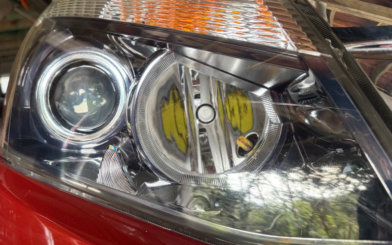 Crystal clear Isuzu D-Max headlight after restoration