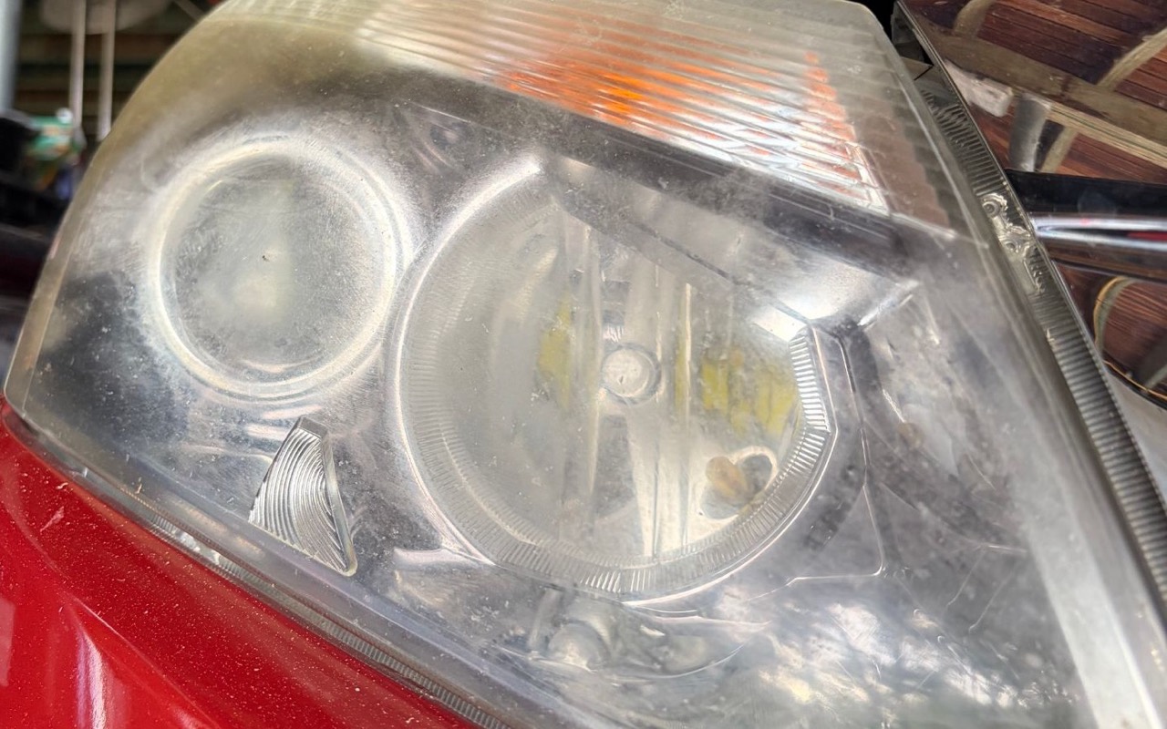 Heavily hazed Isuzu D-Max headlight before restoration